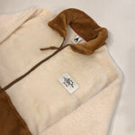 Campera peluche crema